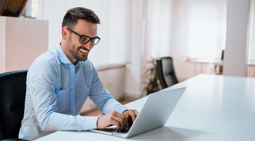 Facility manager working on his laptop