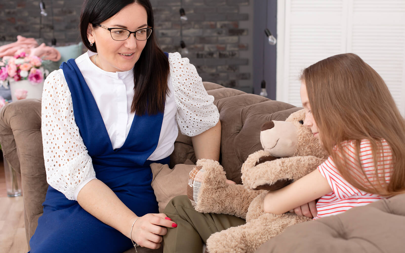 Counselor speaking with a child