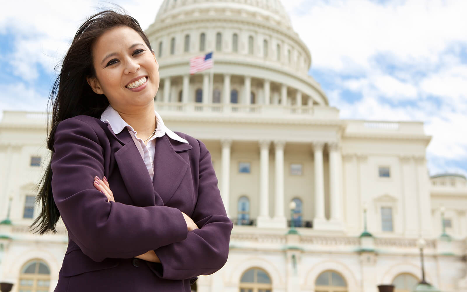 Woman standing in front of US Capital