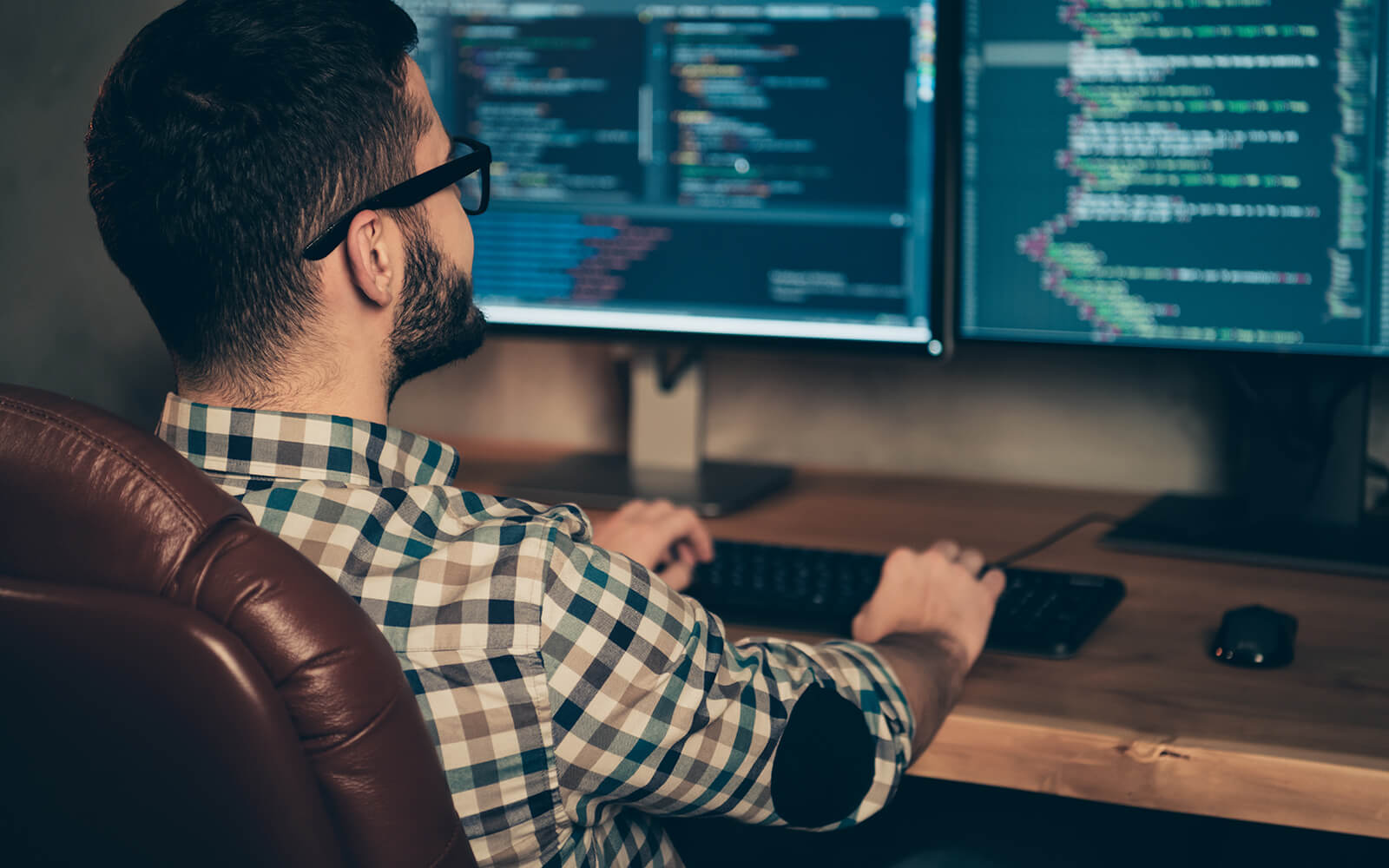 Man working on computer at his desk