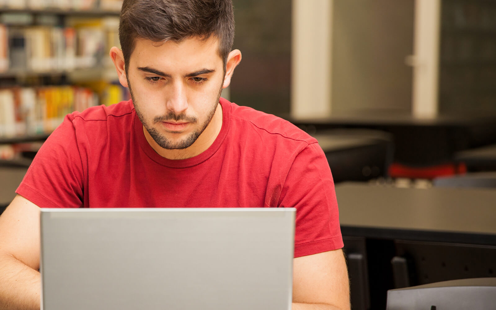 Man working on his laptop computer