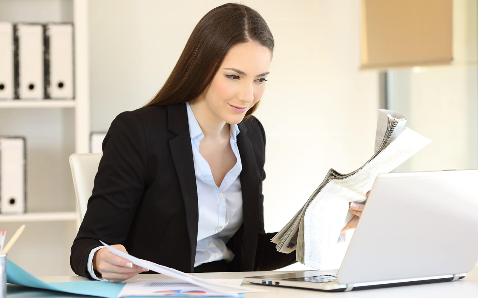 Woman looking through documents