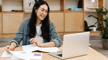 Business woman working at her desk