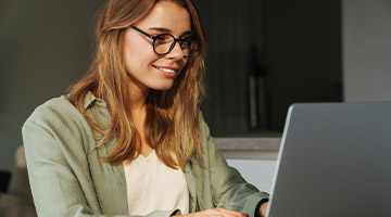 Marketing manager typing on her laptop