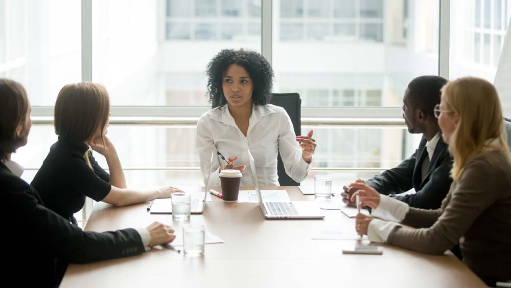 Woman leading public administration meeting