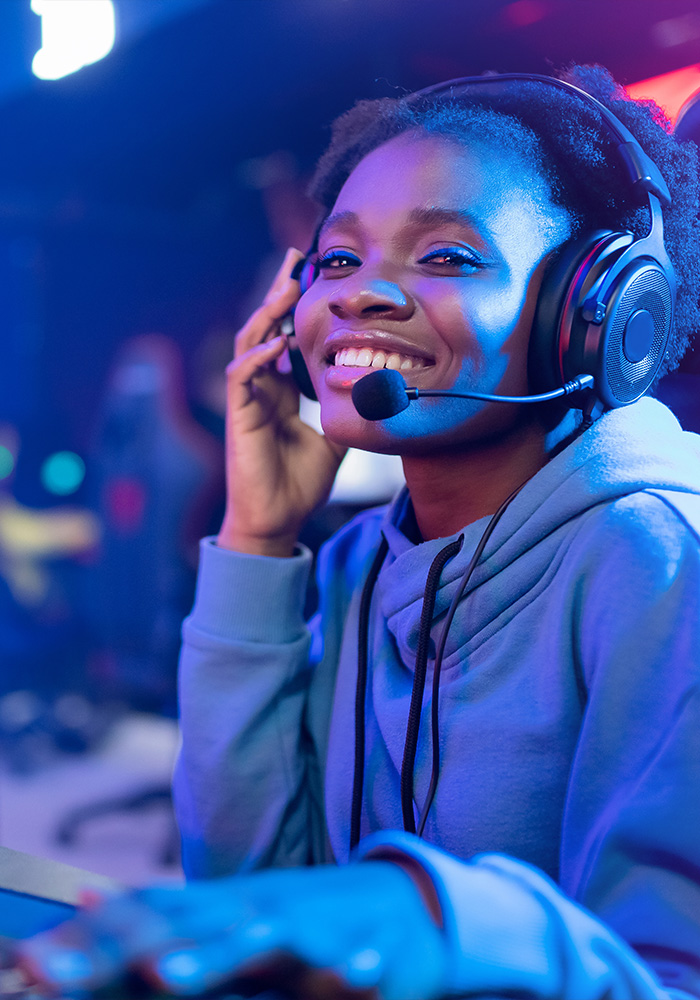 young girl playing game in a gaming room