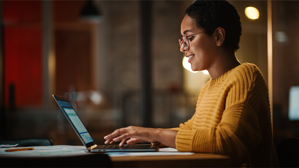 Woman working at a laptop