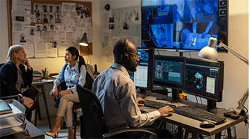 Woman working on computer at her desk
