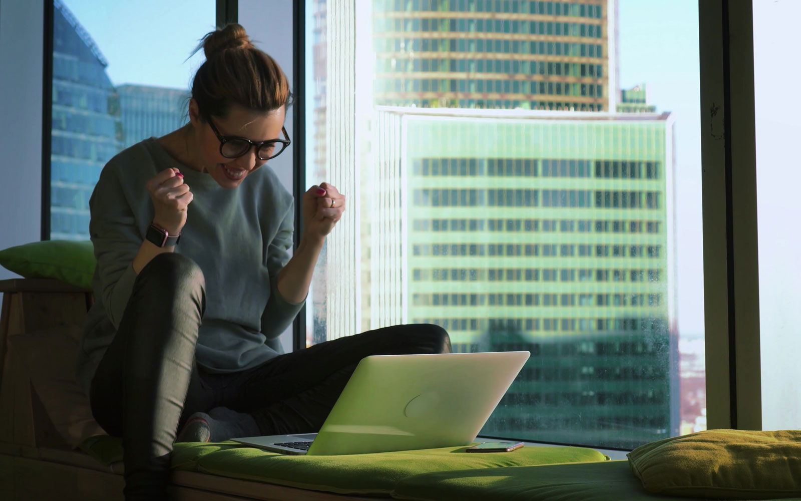 Excited female online student celebrating program completion