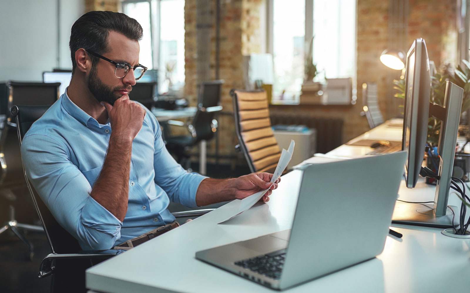 Man working on computer at his desk